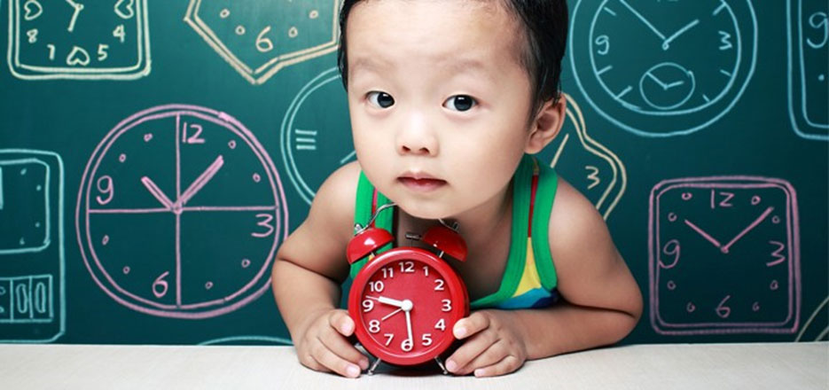 Baby with clock
