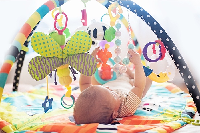 child on the educational mat