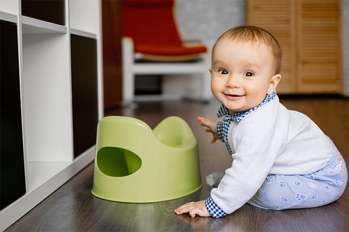 baby with a potty