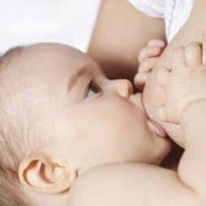 mother breastfeeds baby mother breastfeeds baby