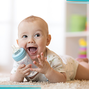 Baby with feeding bottle
