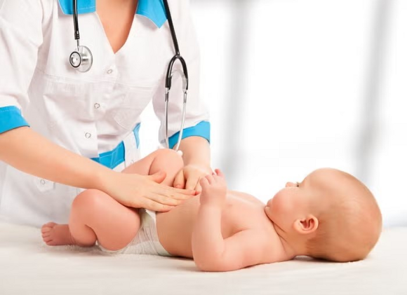 examination of the baby's tummy examination of the baby's tummy